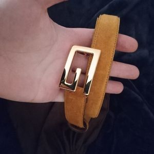 Tan and gold Gucci dress belt